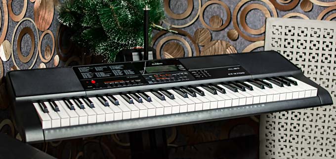 Casio CTX-700 on a stand